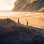 Travellers hiking up a mountain